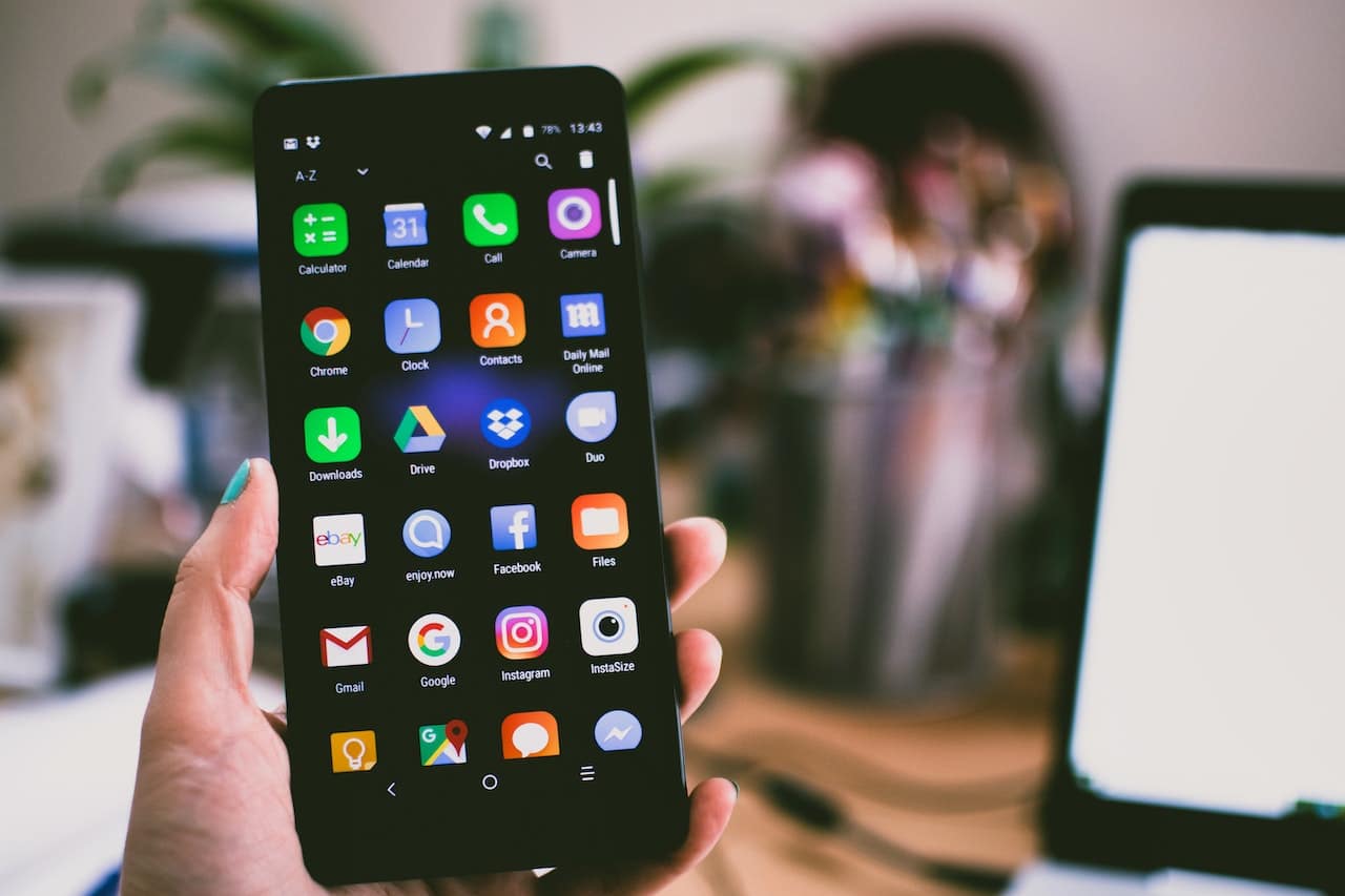 Photo by Lisa Fotios: https://www.pexels.com/photo/selective-focus-photography-of-person-holding-turned-on-smartphone-1092644/ -- event app