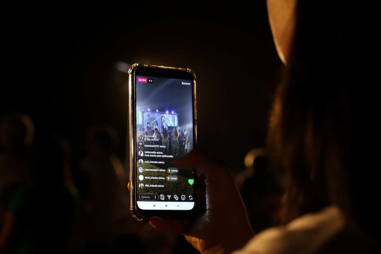 Photo by Nino Souza: https://www.pexels.com/photo/close-up-photo-of-a-person-recording-a-live-performance-with-her-cell-phone-2883051/ -- live-streaming
