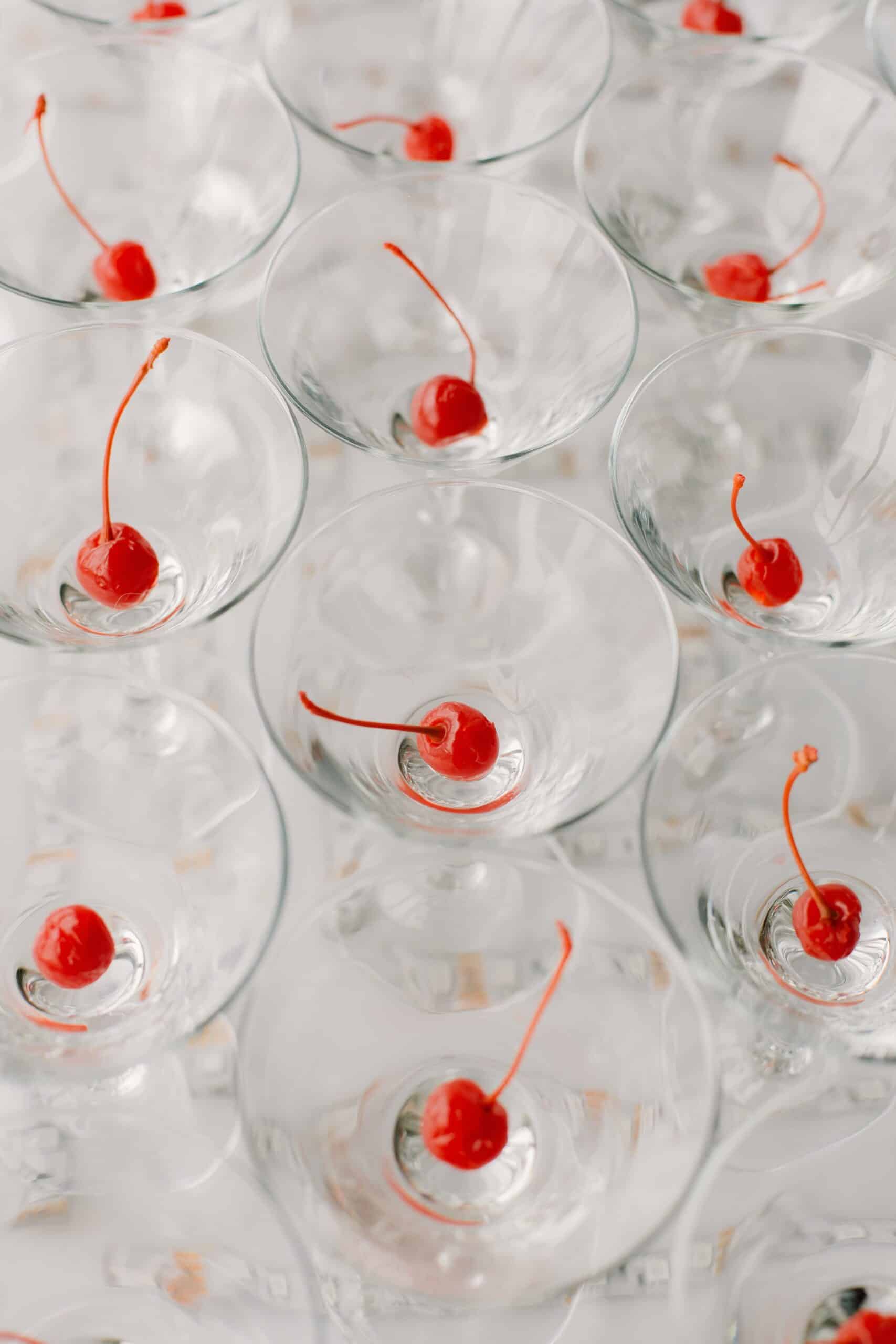 Event Planning Trends Photo by Kseniia Lopyreva: https://www.pexels.com/photo/refreshing-alcoholic-drinks-with-cherries-served-on-white-table-4959831/