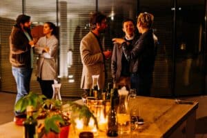 Image Title: Moments of Meaningful Networking Image Description: Professionals engaging in conversation during an event Alt Text: Networking Evening Chat Source: https://unsplash.com/photos/five-person-standing-while-talking-each-other-ZDN-G1xBWHY