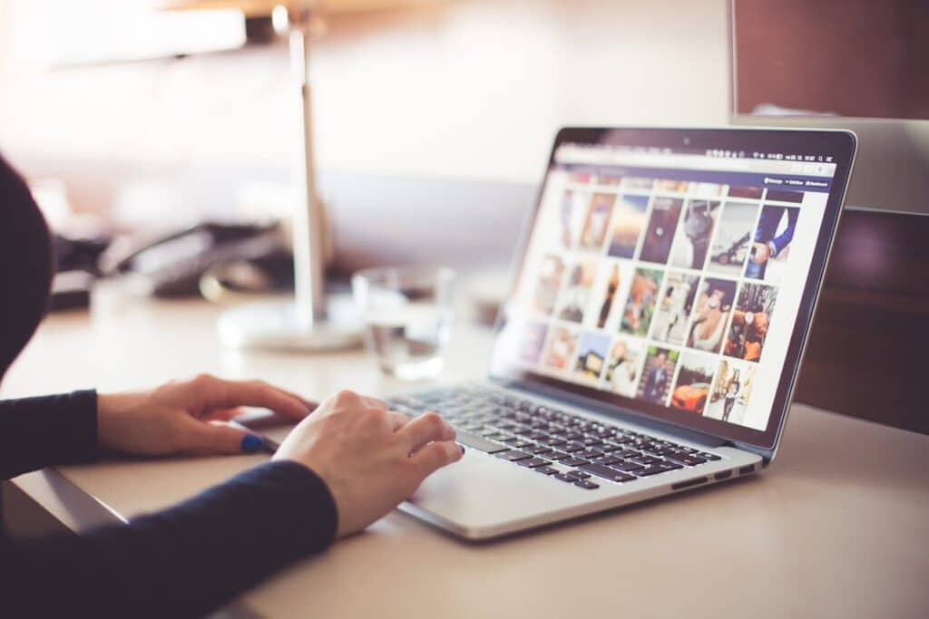 Photo by picjumbo.com: https://www.pexels.com/photo/person-using-laptop-computer-during-daytime-196655/ -- social media