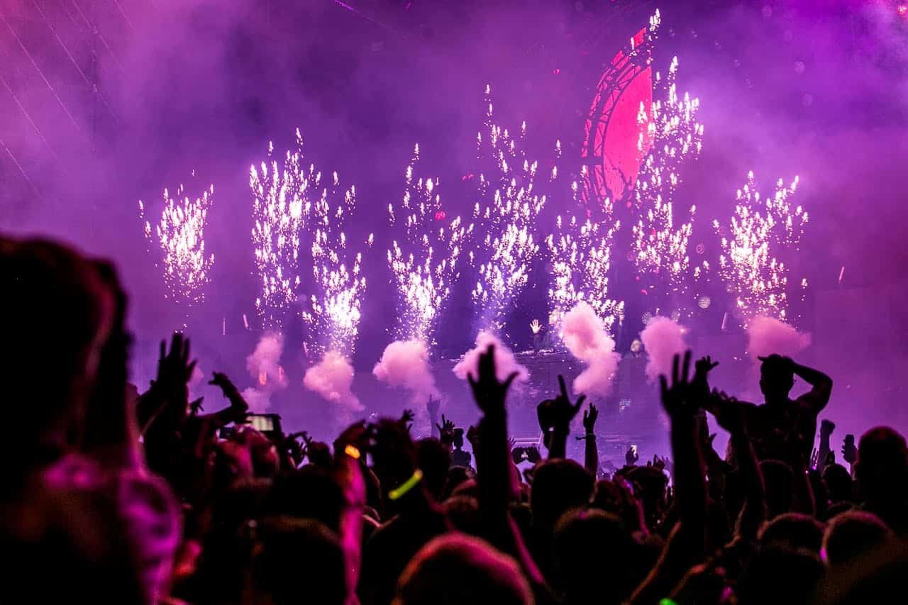 Image title: Innovations in event planning Image alt-title: A party atmosphere during an event. Image URL: https://www.pexels.com/photo/purple-fireworks-effect-1190298/