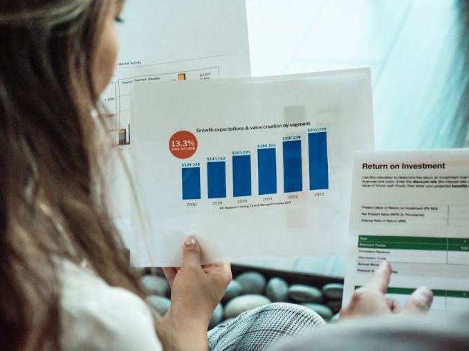 https://www.pexels.com/photo/a-person-reading-documents-and-reports-7651553/