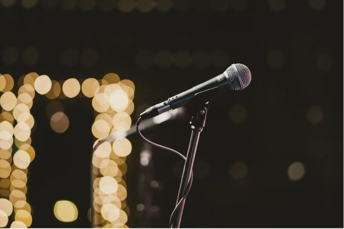 https://www.pexels.com/photo/selective-focus-photography-of-microphone-on-microphone-stand-1745762/