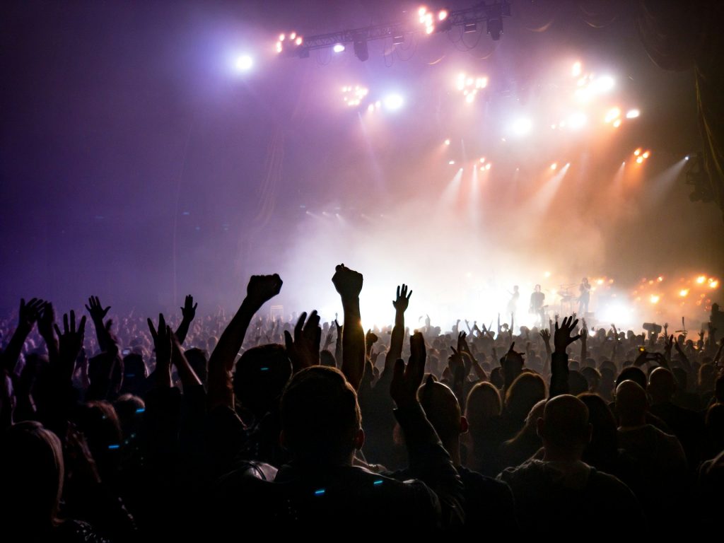 https://unsplash.com/photos/crowd-facing-lighted-stage-eXVd7gDPO9A Photo by ActionVance on Unsplash