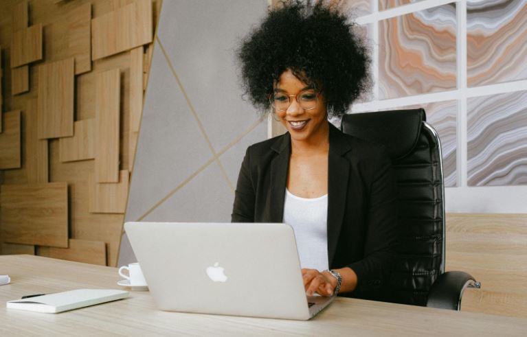 https://www.pexels.com/photo/woman-in-black-blazer-sitting-by-the-table-while-using-macbook-3727459/