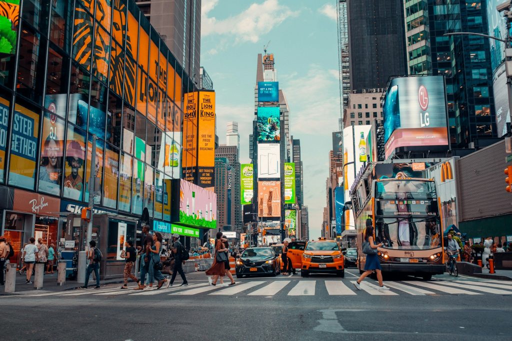 https://unsplash.com/photos/people-walking-on-pedestrian-lane-near-high-rise-buildings-during-daytime-GibtF-RTQpc Photo by Benny Rotlevy on Unsplash