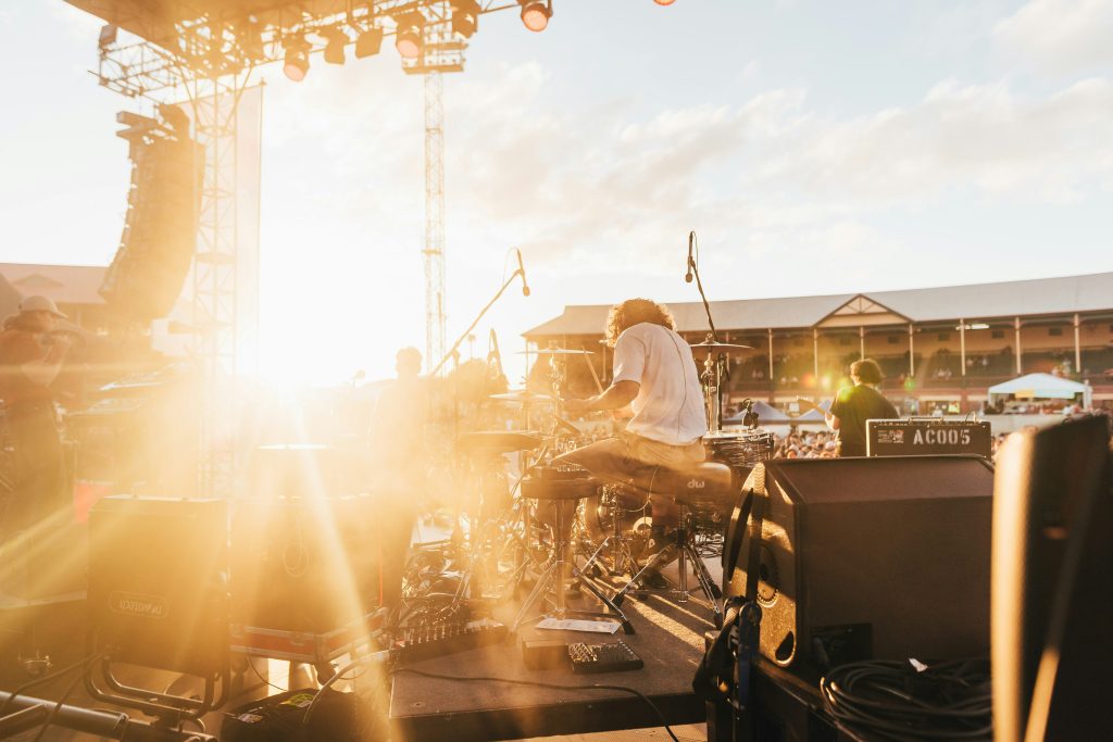 https://unsplash.com/photos/photo-of-music-band-performing-at-front-of-crowded-stadium-under-blue-sky-zZxs1_uupOQ Photo by Danny Howe on Unsplash