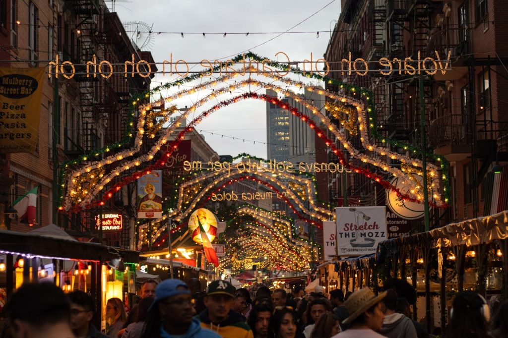 https://www.pexels.com/photo/festive-street-market-with-vibrant-lights-display-28574757/ Photo by Sean Ingram on Pexels