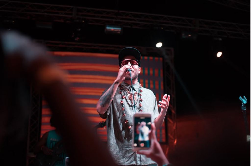 https://unsplash.com/photos/band-vocalist-performing-on-stage-50v-FvtWR-c Photo by Ronny Nivar on Unsplash