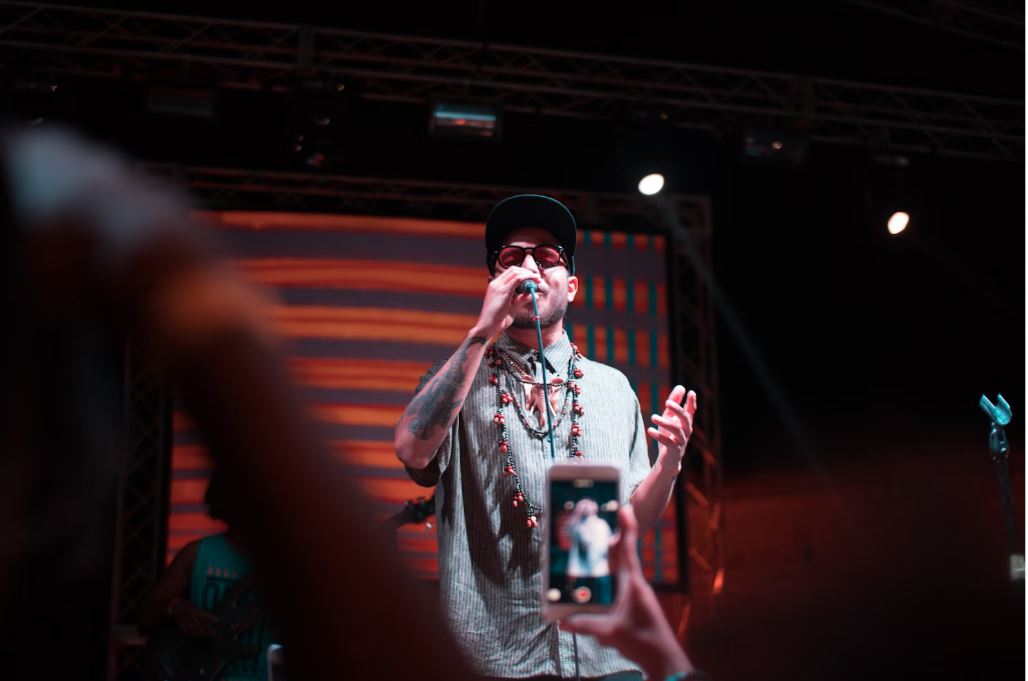 https://unsplash.com/photos/band-vocalist-performing-on-stage-50v-FvtWR-c Photo by Ronny Nivar on Unsplash