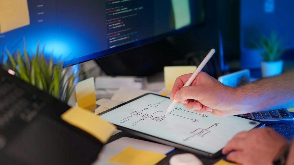 https://unsplash.com/photos/someone-is-drawing-on-a-tablet-at-their-desk-vhZ8K5Np9mk
