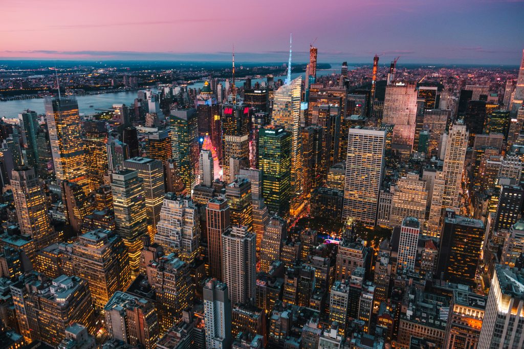https://unsplash.com/photos/lighted-high-rise-buildings-during-golden-hour-ZXBPMnNVtlE Photo by Jan Folwarczny on Unsplash