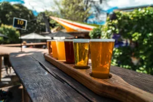 https://www.pexels.com/photo/a-wooden-tray-with-several-beers-on-it-27623559/ Photo by Donavan Kelly on Pexels