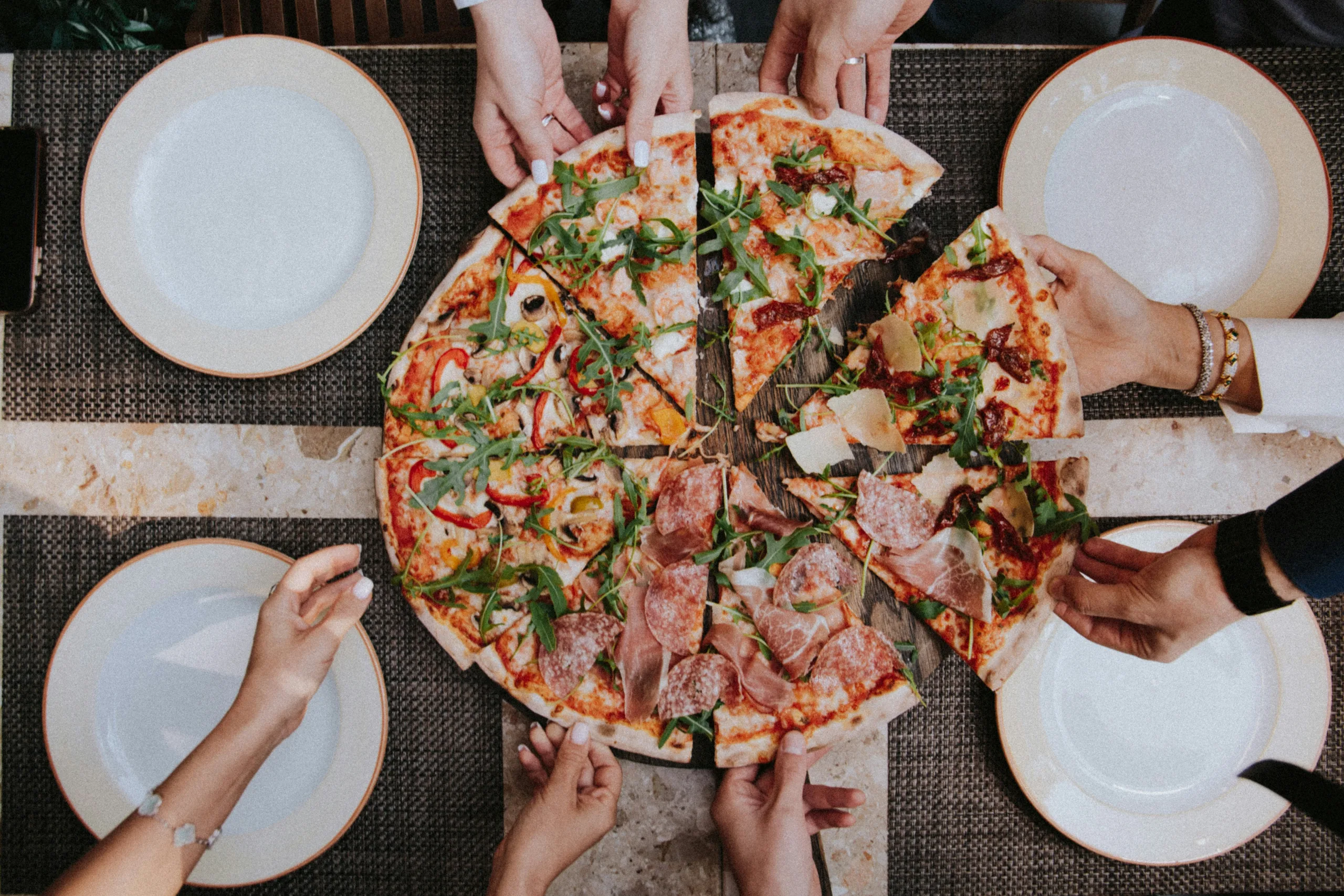https://unsplash.com/photos/pizza-on-white-ceramic-plate-WcV2YkM3Dls Photo by Klara Kulikova on Unsplash