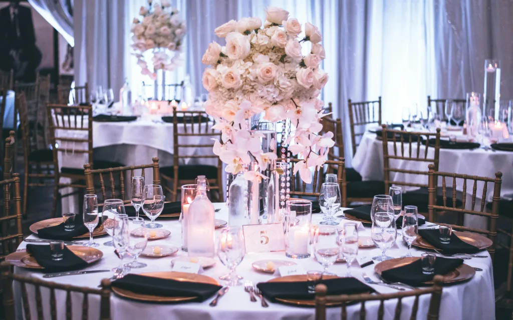 Photo by Tae Fuller: https://www.pexels.com/photo/pink-and-white-roses-centerpiece-on-top-of-table-1616113/