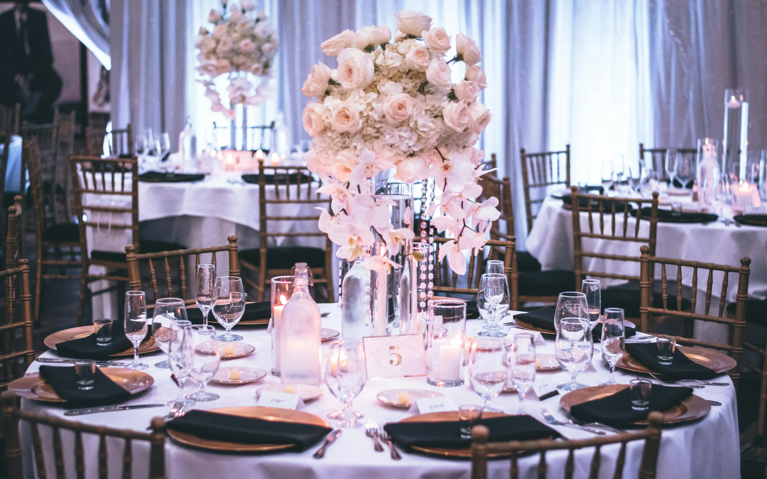 Photo by Tae Fuller: https://www.pexels.com/photo/pink-and-white-roses-centerpiece-on-top-of-table-1616113/