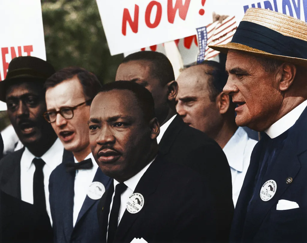 https://unsplash.com/photos/dr-martin-luther-king-jr-and-mathew-ahmann-in-a-crowd-of-demonstrators-at-the-march-on-washington-bTF3gkd2L28 Photo by Unseen Histories on Unsplash
