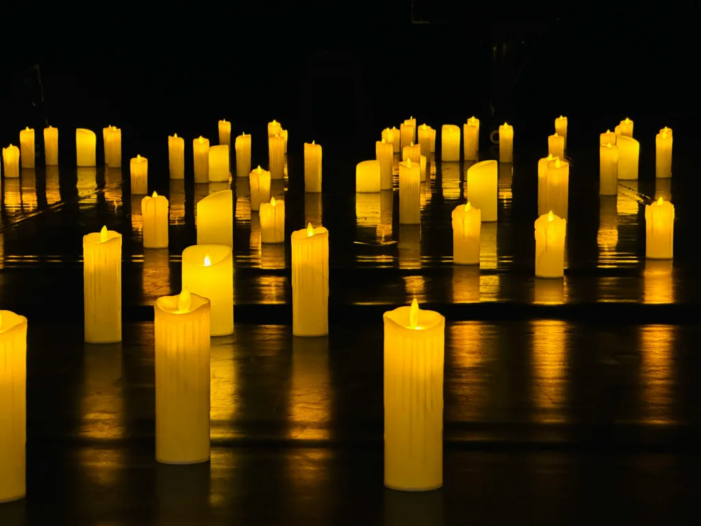 https://unsplash.com/photos/a-number-of-lit-candles-on-a-table-fJQWrVnvrWw Photo by Mary Borozdina on Unsplash