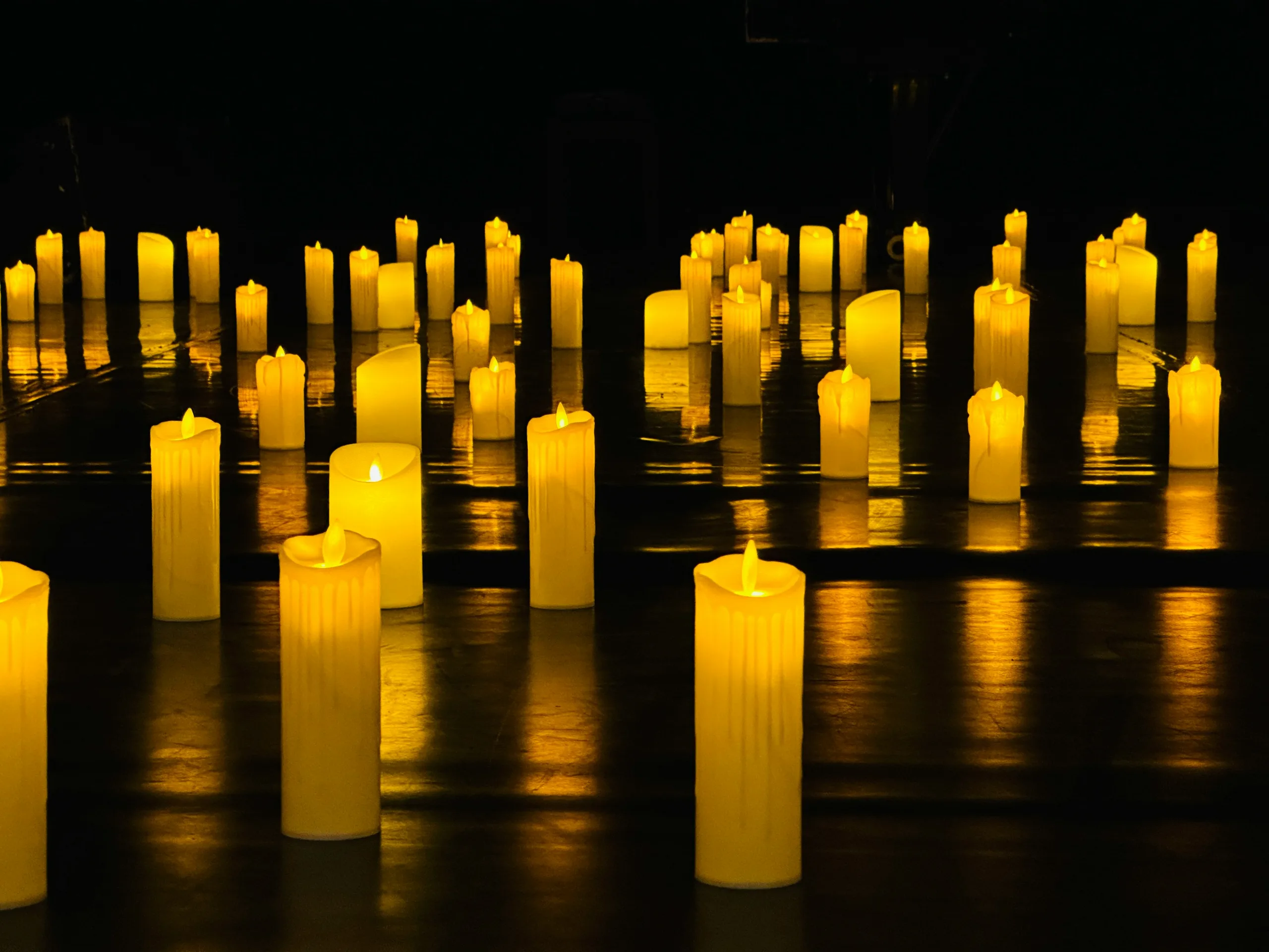 https://unsplash.com/photos/a-number-of-lit-candles-on-a-table-fJQWrVnvrWw Photo by Mary Borozdina on Unsplash