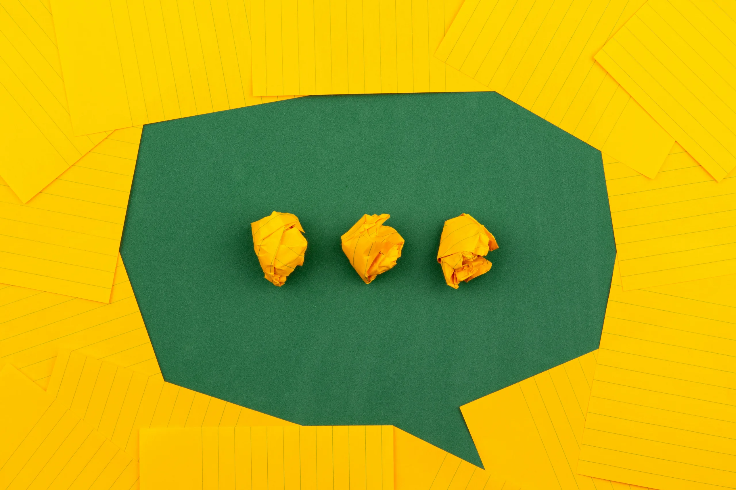 https://unsplash.com/photos/three-crumpled-yellow-papers-on-green-surface-surrounded-by-yellow-lined-papers-V5vqWC9gyEU Photo by Volodymyr Hryshchenko on Unsplash