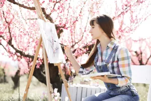 https://unsplash.com/photos/a-woman-sitting-in-front-of-a-cherry-tree-painting-a-picture-Xl5ac4dZsW0 Photo by Jennie Razumnaya on Unsplash