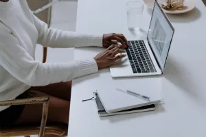 Photo by cottonbro studio: https://www.pexels.com/photo/person-in-white-long-sleeve-shirt-using-macbook-pro-5077047/