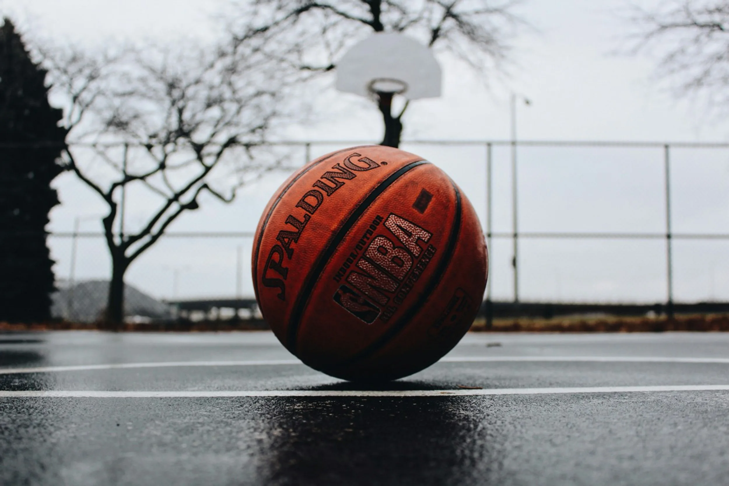 https://unsplash.com/photos/spalding-basketball-in-court-Gl0jBJJTDWs Photo by TJ Dragotta on Unsplash