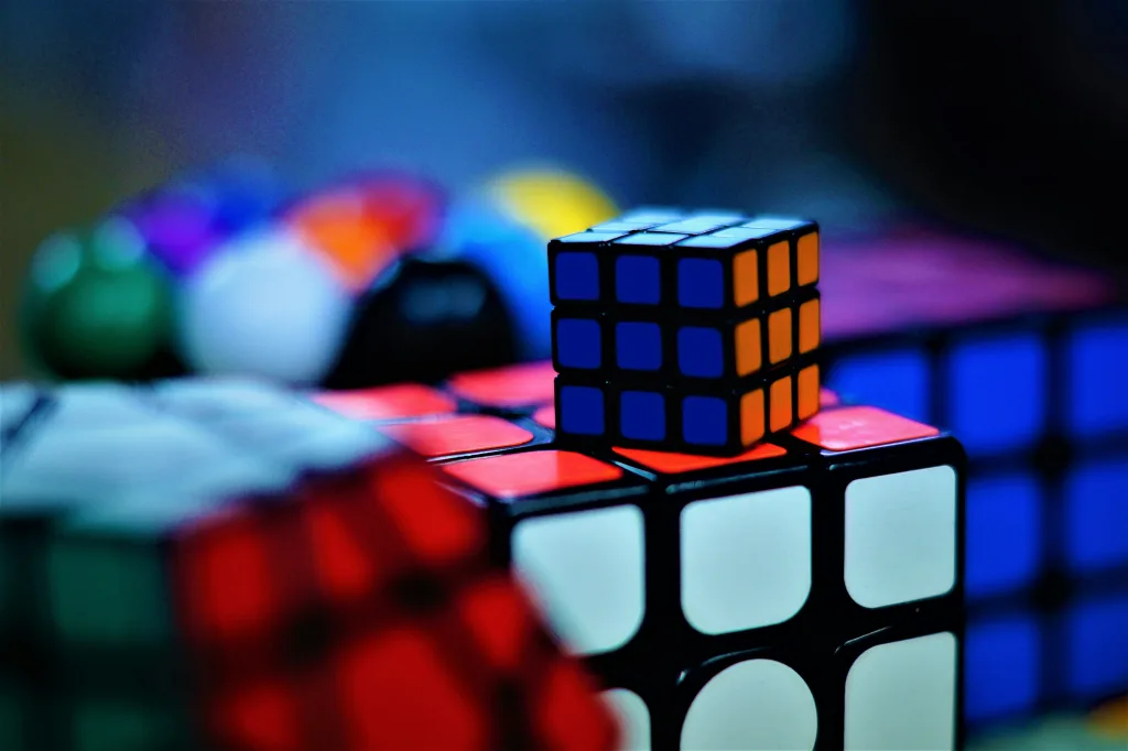 https://unsplash.com/photos/shallow-focus-photo-of-rubiks-cubes-liMvhbUq4Xg Photo by Fletcher Pride on Unsplash