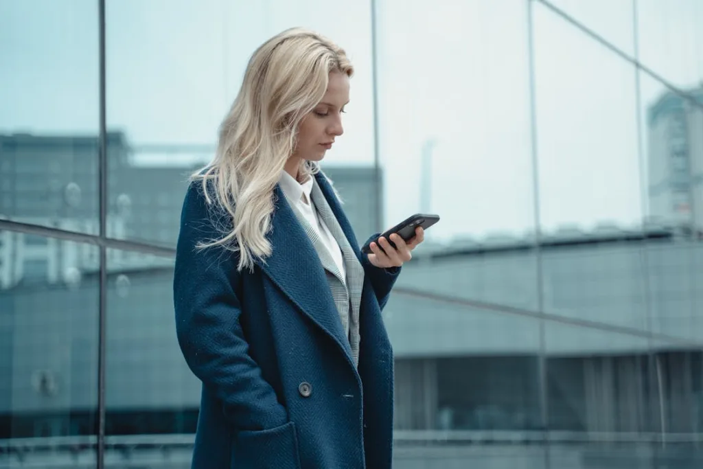 Photo by Tima Miroshnichenko: https://www.pexels.com/photo/a-woman-in-a-blue-coat-using-her-phone-5717224/ 