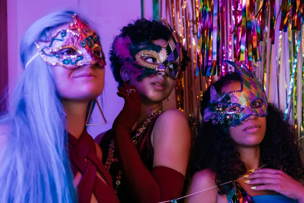 Photo by Mikhail Nilov: https://www.pexels.com/photo/three-women-wearing-a-colorful-masquerade-masks-9391354/ 