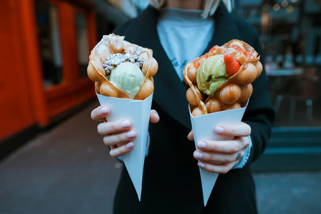https://unsplash.com/photos/person-holding-two-ice-creams-MrmWoU9QDjs Photo by Toa Heftiba on Unsplash