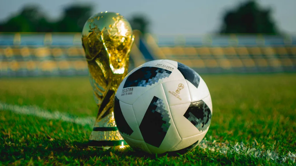 https://unsplash.com/photos/soccer-ball-beside-trophy-on-soccer-field-crn276hbbYU Photo by Fauzan Saari on Unsplash