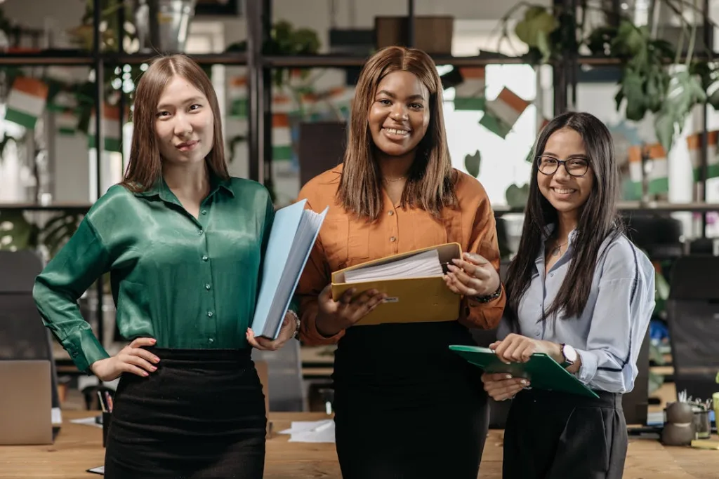 Photo by Pavel Danilyuk: https://www.pexels.com/photo/a-group-of-women-smiling-while-holding-files-7658284/ 