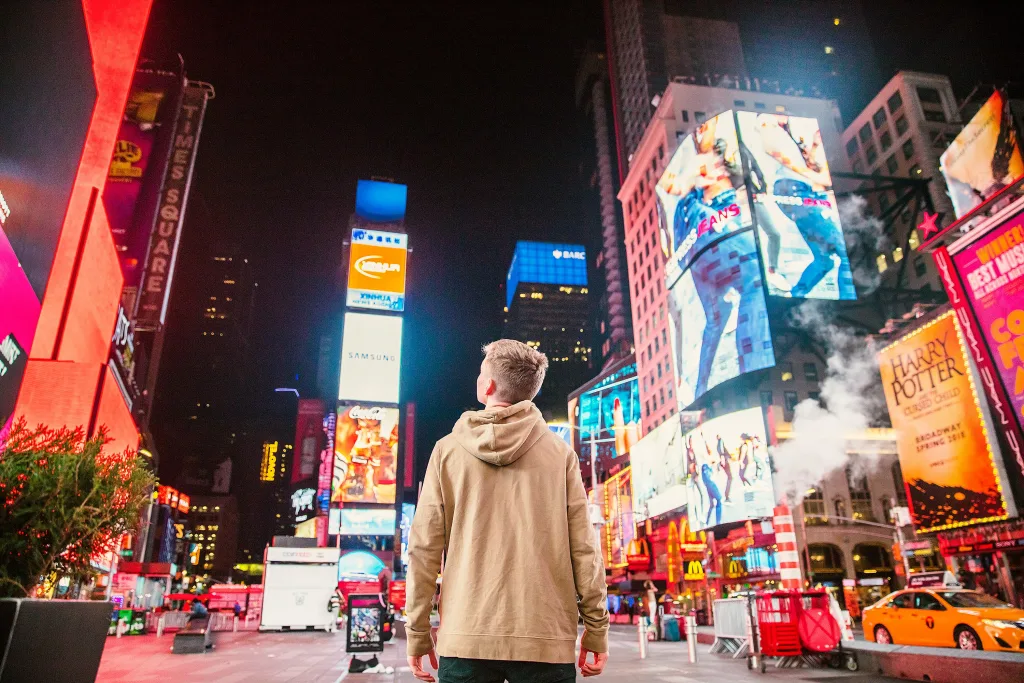 https://unsplash.com/photos/man-standing-on-road-infront-of-high-rise-buildi-X_roZ7toBJY Photo by Joshua Earle on Unsplash