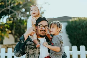 https://unsplash.com/photos/man-in-white-shirt-carrying-girl-in-gray-shirt-Wr3comVZJxU Photo by Nathan Dumlao on Unsplash