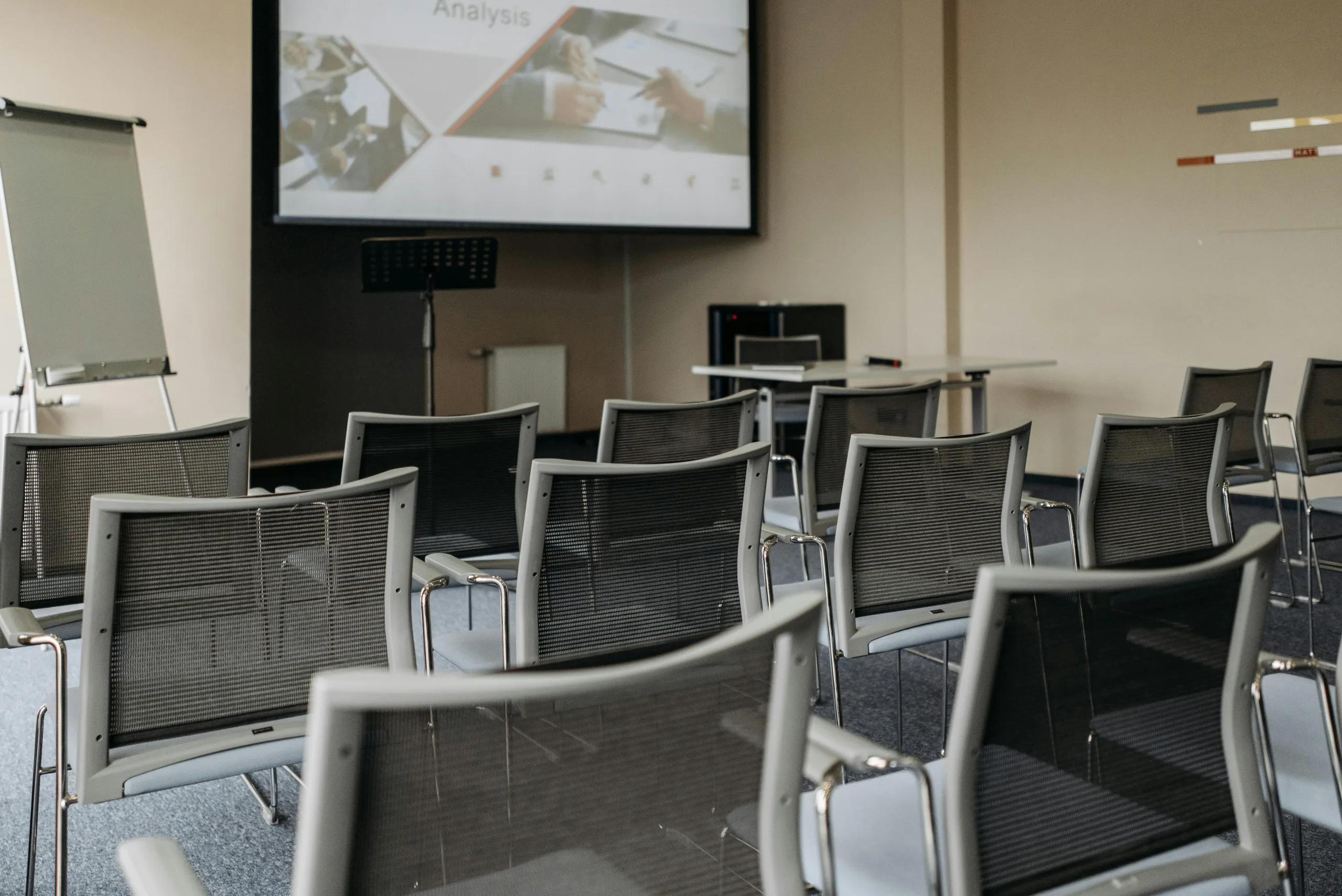 Photo by Pavel Danilyuk: https://www.pexels.com/photo/chairs-arranged-inside-a-conference-room-8761316/