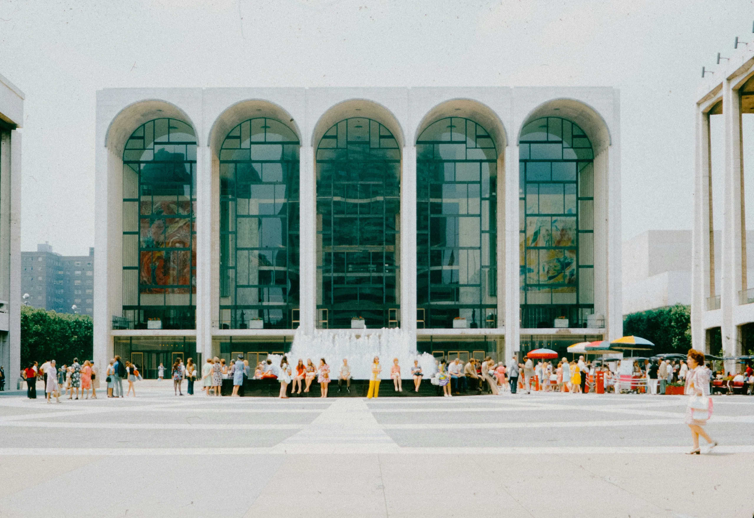 https://unsplash.com/photos/a-group-of-people-standing-in-front-of-a-building-6mCEAqZgVFE Photo by Annie Spratt on Unsplash