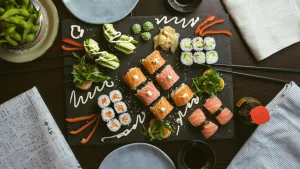https://unsplash.com/photos/sushi-on-black-ceramic-plate-iOHJKJqO6E0 Photo by Jakub Dziubak on Unsplash