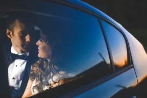 https://unsplash.com/photos/a-man-and-a-woman-in-a-car-okQERrxquws Photo by Marius Muresan on Unsplash