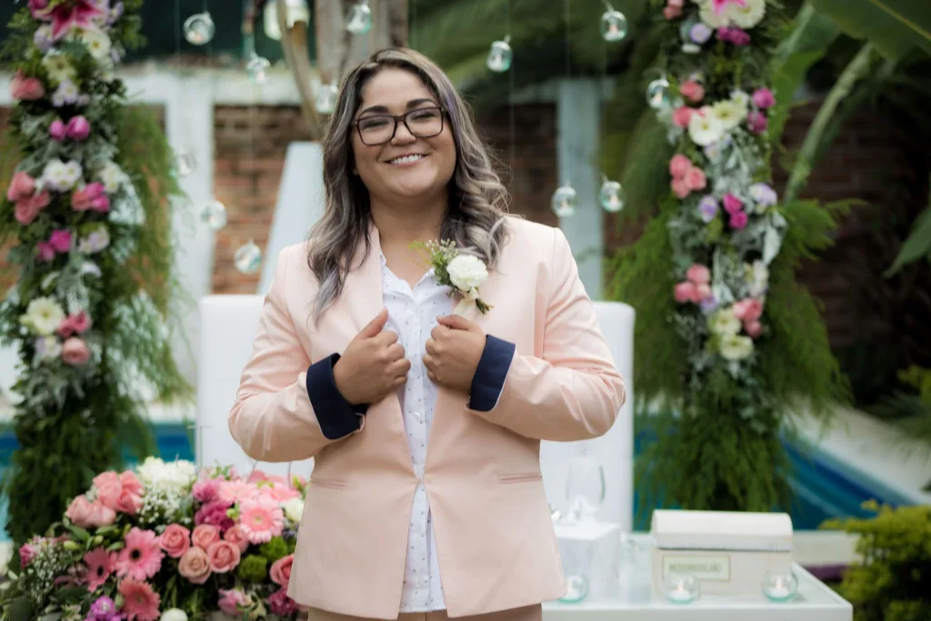 https://www.pexels.com/photo/smiling-woman-in-peach-blazer-wearing-a-black-framed-eyeglasses-5978135/