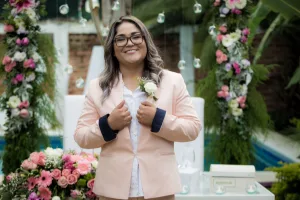 https://www.pexels.com/photo/smiling-woman-in-peach-blazer-wearing-a-black-framed-eyeglasses-5978135/
