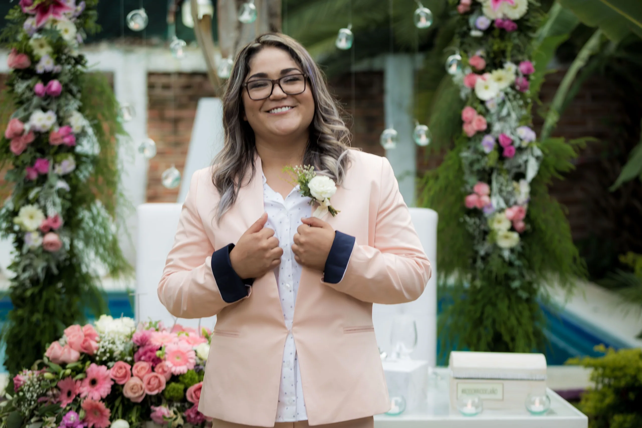https://www.pexels.com/photo/smiling-woman-in-peach-blazer-wearing-a-black-framed-eyeglasses-5978135/
