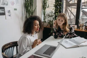 https://www.pexels.com/photo/women-looking-at-laptop-scree-6925397/