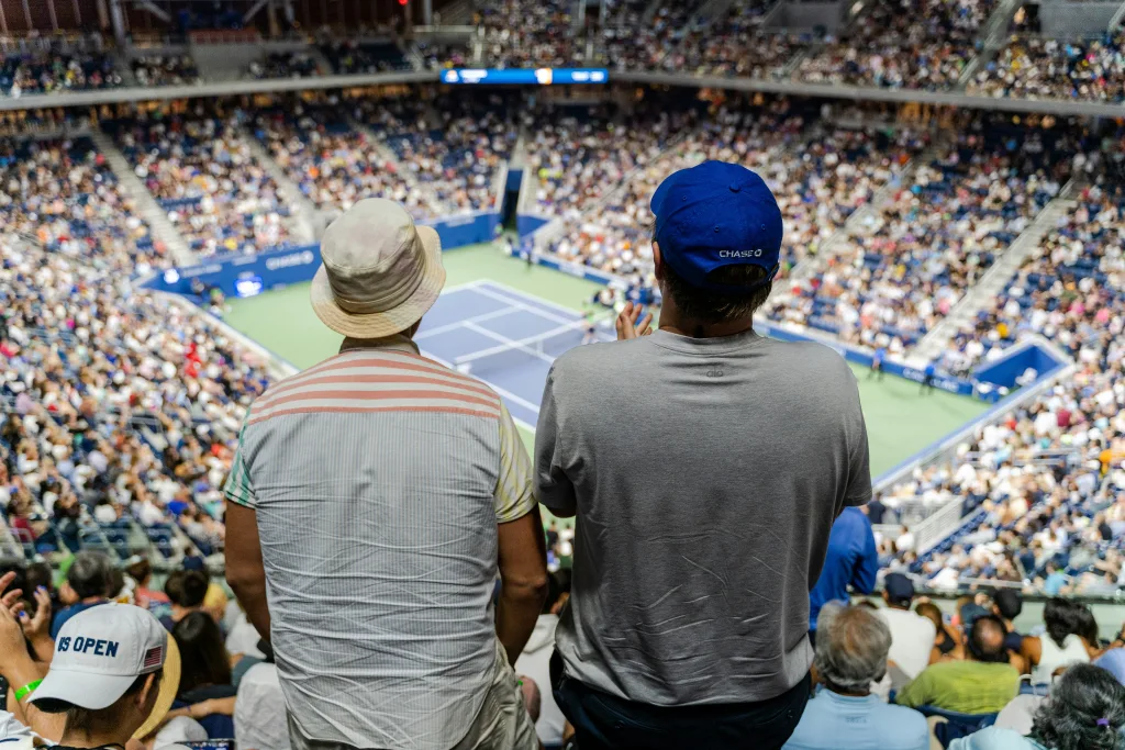 https://unsplash.com/photos/a-couple-of-men-in-a-stadium-kIVLl_SHKcM Photo by Dylan Freedom on Unsplash