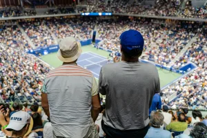 https://unsplash.com/photos/a-couple-of-men-in-a-stadium-kIVLl_SHKcM Photo by Dylan Freedom on Unsplash