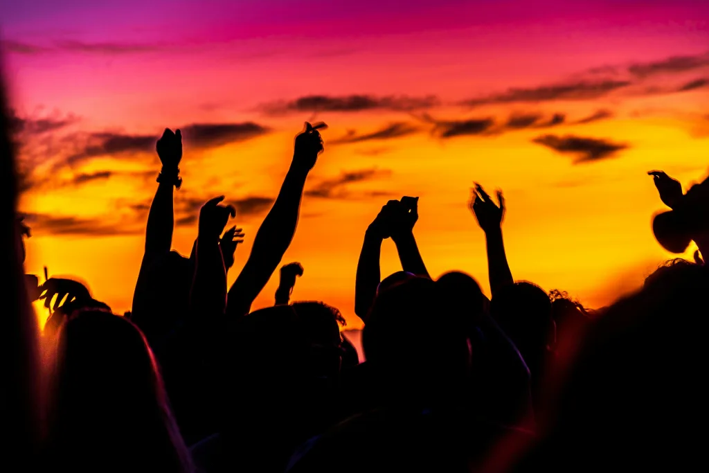 https://unsplash.com/photos/silhouette-of-people-raising-their-hands-during-sunset-kvBOc0nxNlk