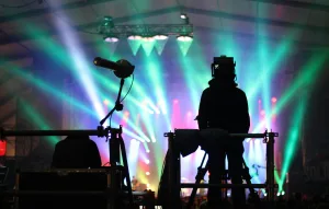https://unsplash.com/photos/silhouette-of-man-standing-on-stage-4Ixxu74o06E
