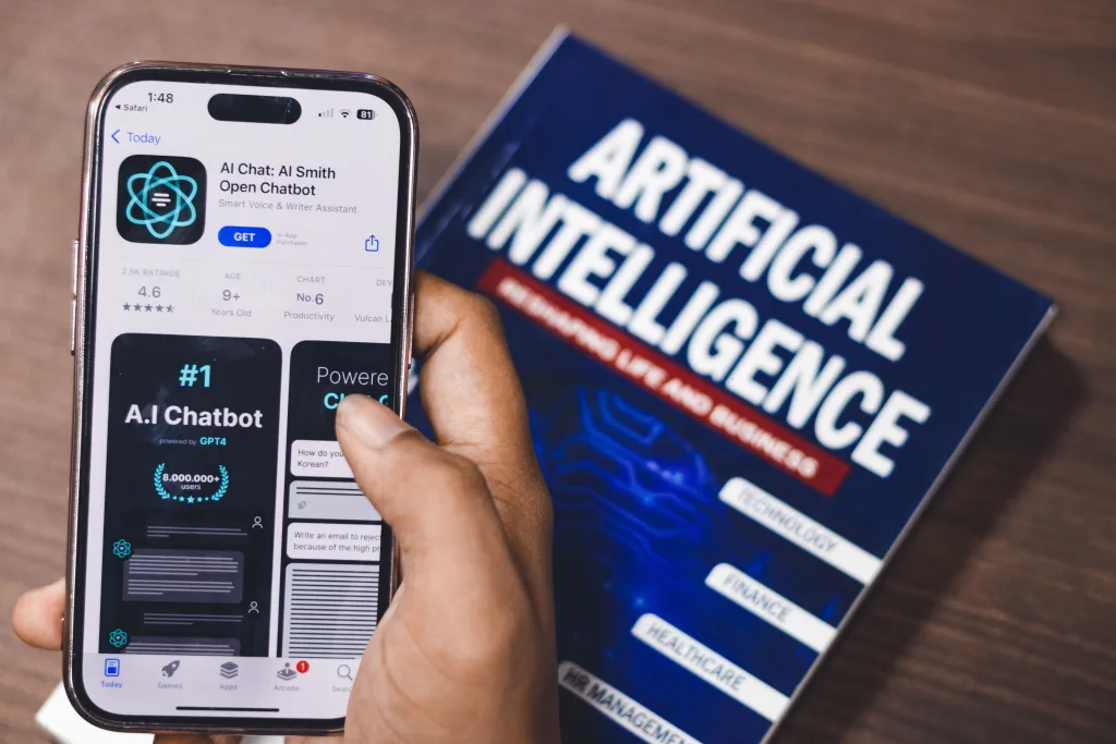 Photo by Sanket Mishra: https://www.pexels.com/photo/webpage-of-ai-chatbot-a-prototype-ai-smith-open-chatbot-is-seen-on-the-website-of-openai-on-a-apple-smartphone-examples-capabilities-and-limitations-are-shown-16380906/