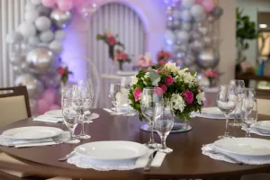 https://www.pexels.com/photo/flowers-on-table-with-plates-and-glasses-14457437/